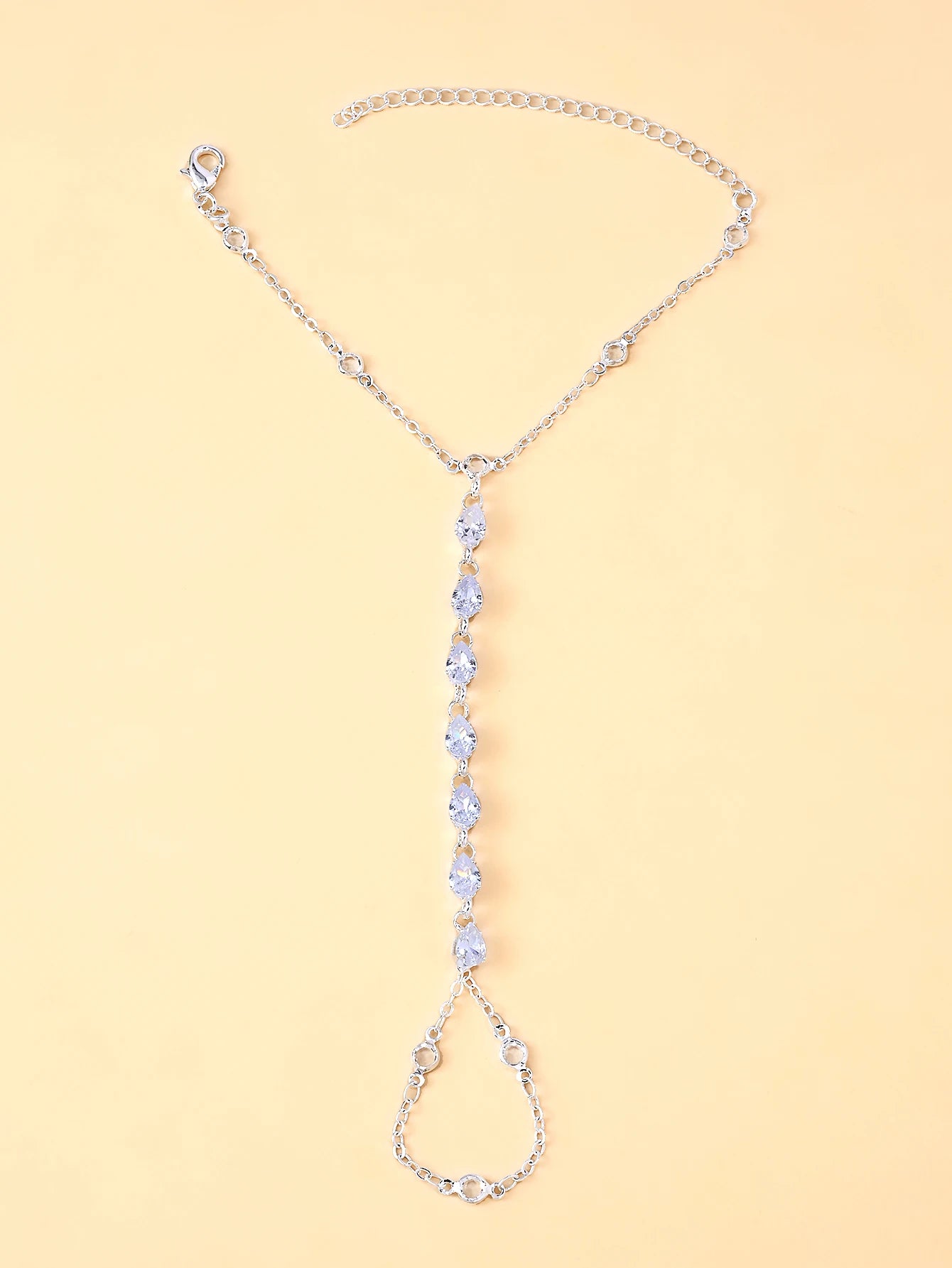 A rhinestone finger bracelet, a fashionable piece of jewelry for everyday wear, a trendy and simple accessory for women.