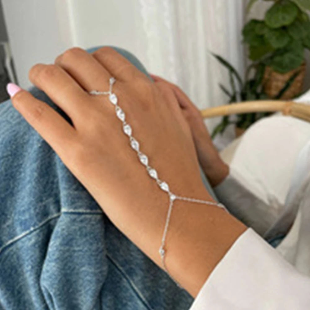 A rhinestone finger bracelet, a fashionable piece of jewelry for everyday wear, a trendy and simple accessory for women.