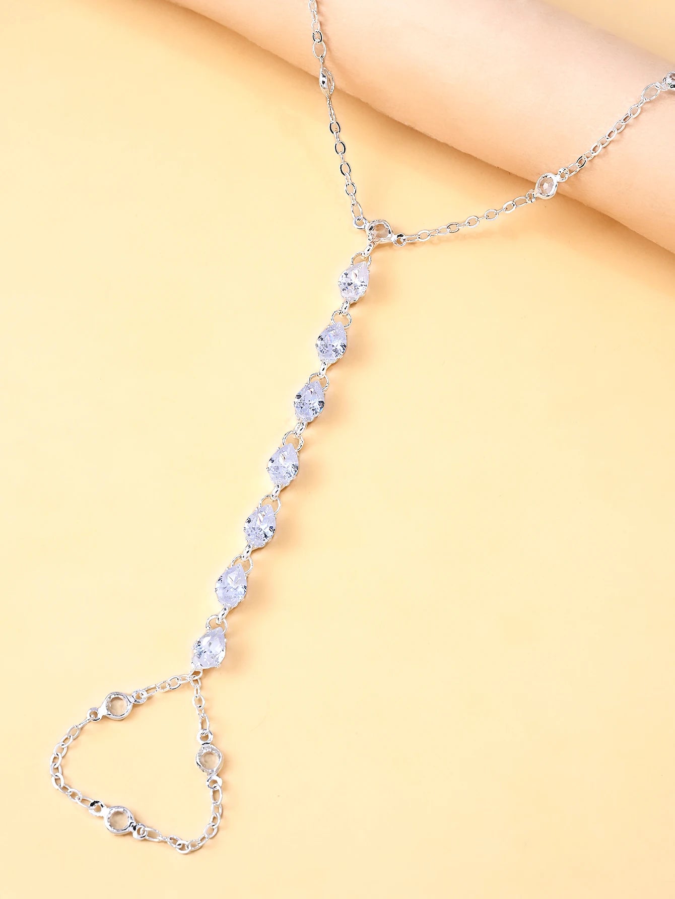 A rhinestone finger bracelet, a fashionable piece of jewelry for everyday wear, a trendy and simple accessory for women.